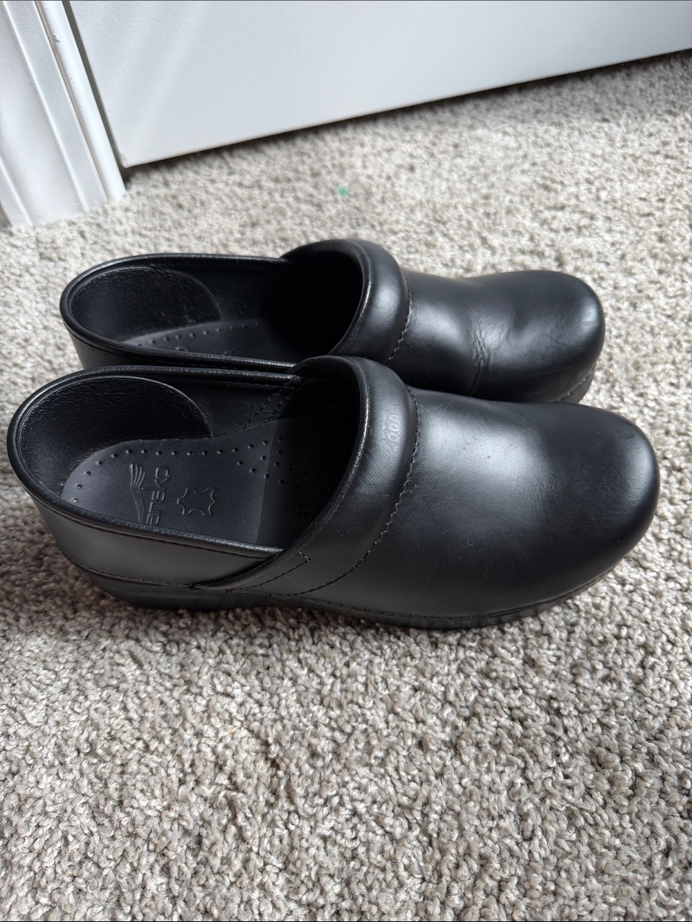 Dansko Black Leather Slip-On Clogs